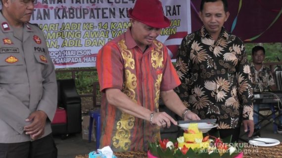 Asisten III Hadiri Perayaan HUT Kampung Awai Ke-14